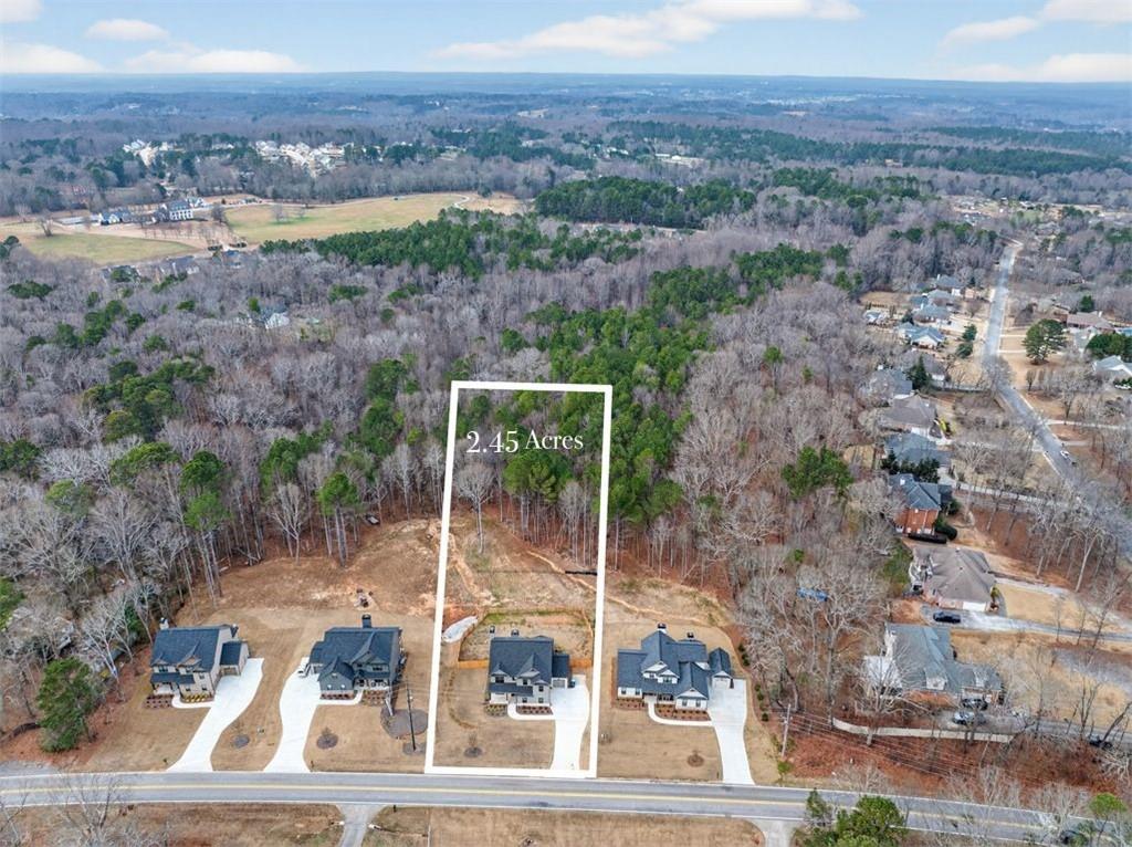 311 Rockwell Church Road Northwest Winder, GA 30680 - Photo 3 of 55 an aerial view of multiple house