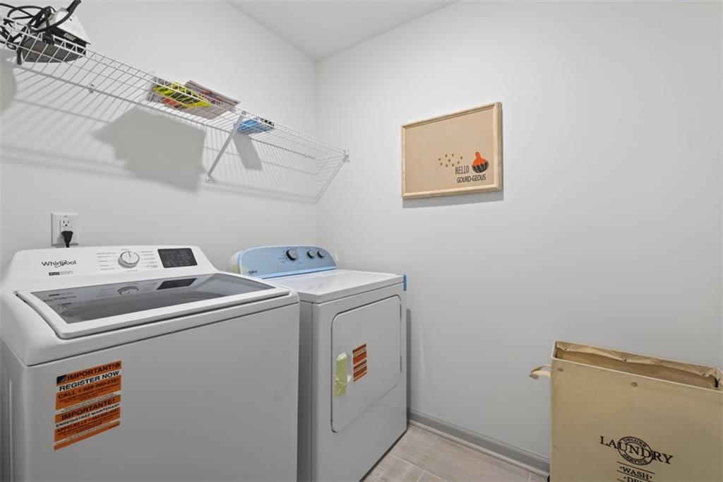 311 Rockwell Church Road Northwest Winder, GA 30680 - Photo 31 of 55 a utility room with dryer and washer