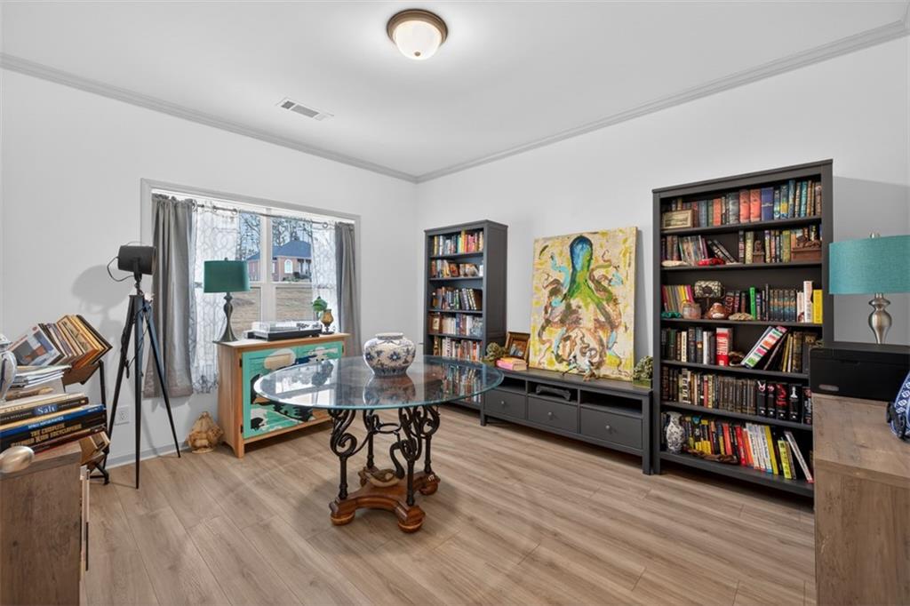 311 Rockwell Church Road Northwest Winder, GA 30680 - Photo 4 of 55 a view of a workspace with furniture and lounge chair