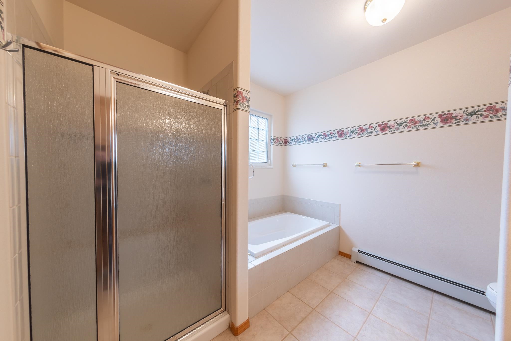 2802 Grand View Circle Grand Junction, CO 81506 - Photo 16 of 21 a bathroom with a bath tub and shower