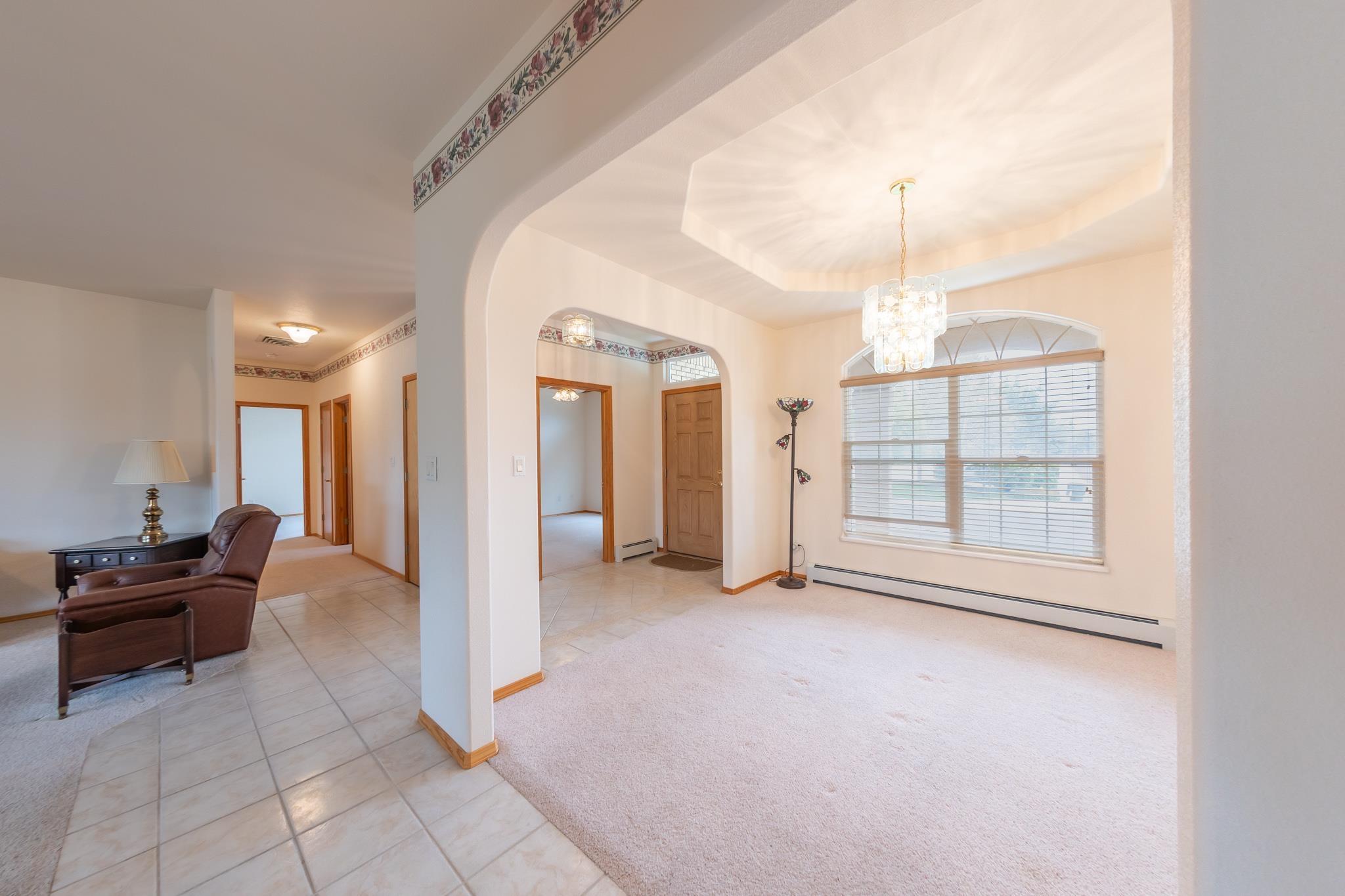 2802 Grand View Circle Grand Junction, CO 81506 - Photo 3 of 21 a living room with furniture and a chandelier