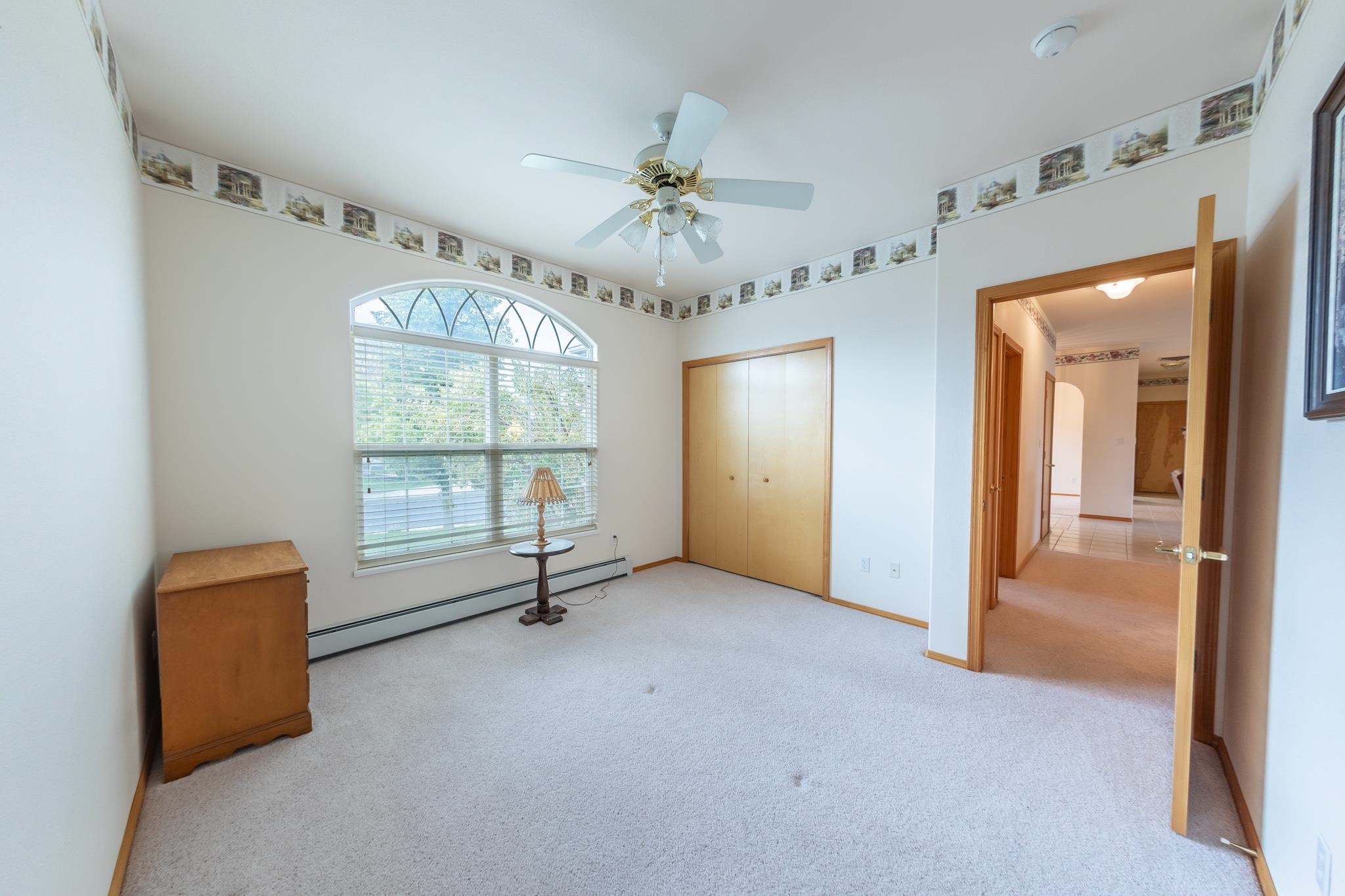 2802 Grand View Circle Grand Junction, CO 81506 - Photo 9 of 21 wooden floor in an empty room with a window