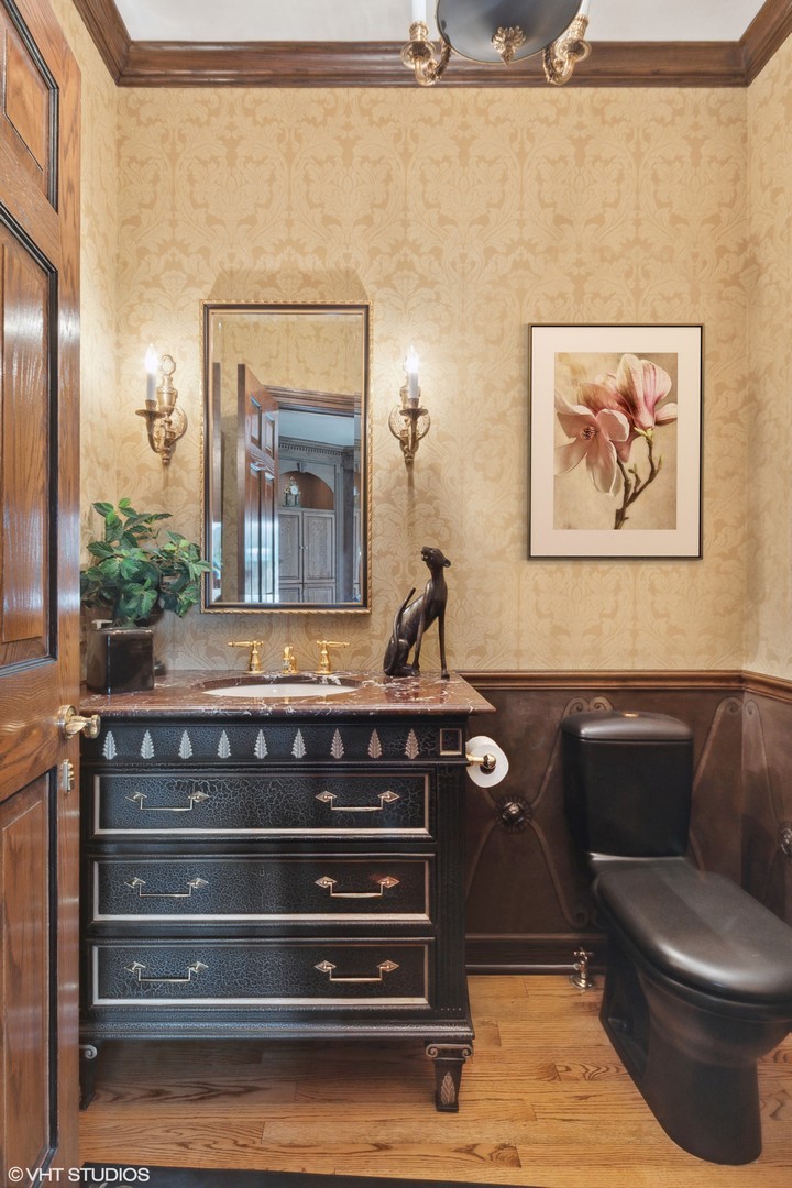 211 Otis Road Barrington Hills, IL 60010 - Photo 23 of 68 a bathroom with a toilet a sink and mirror