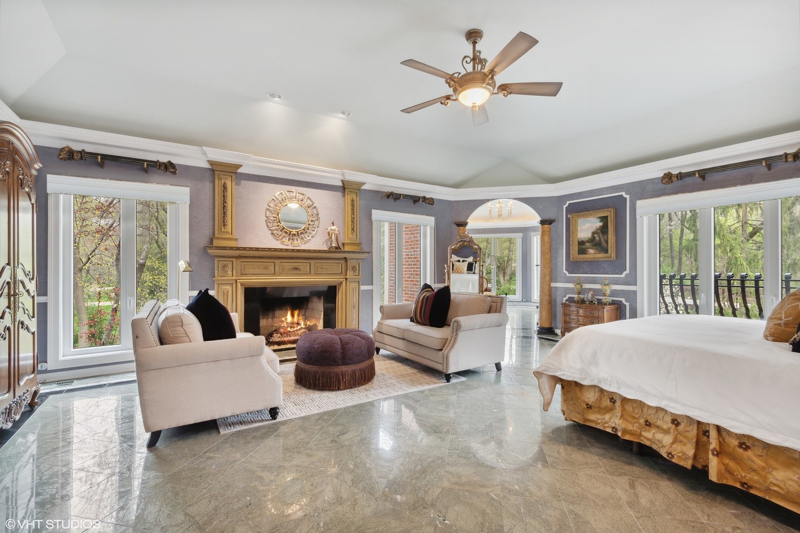 211 Otis Road Barrington Hills, IL 60010 - Photo 26 of 68 a spacious bedroom with a bed a couch and large window