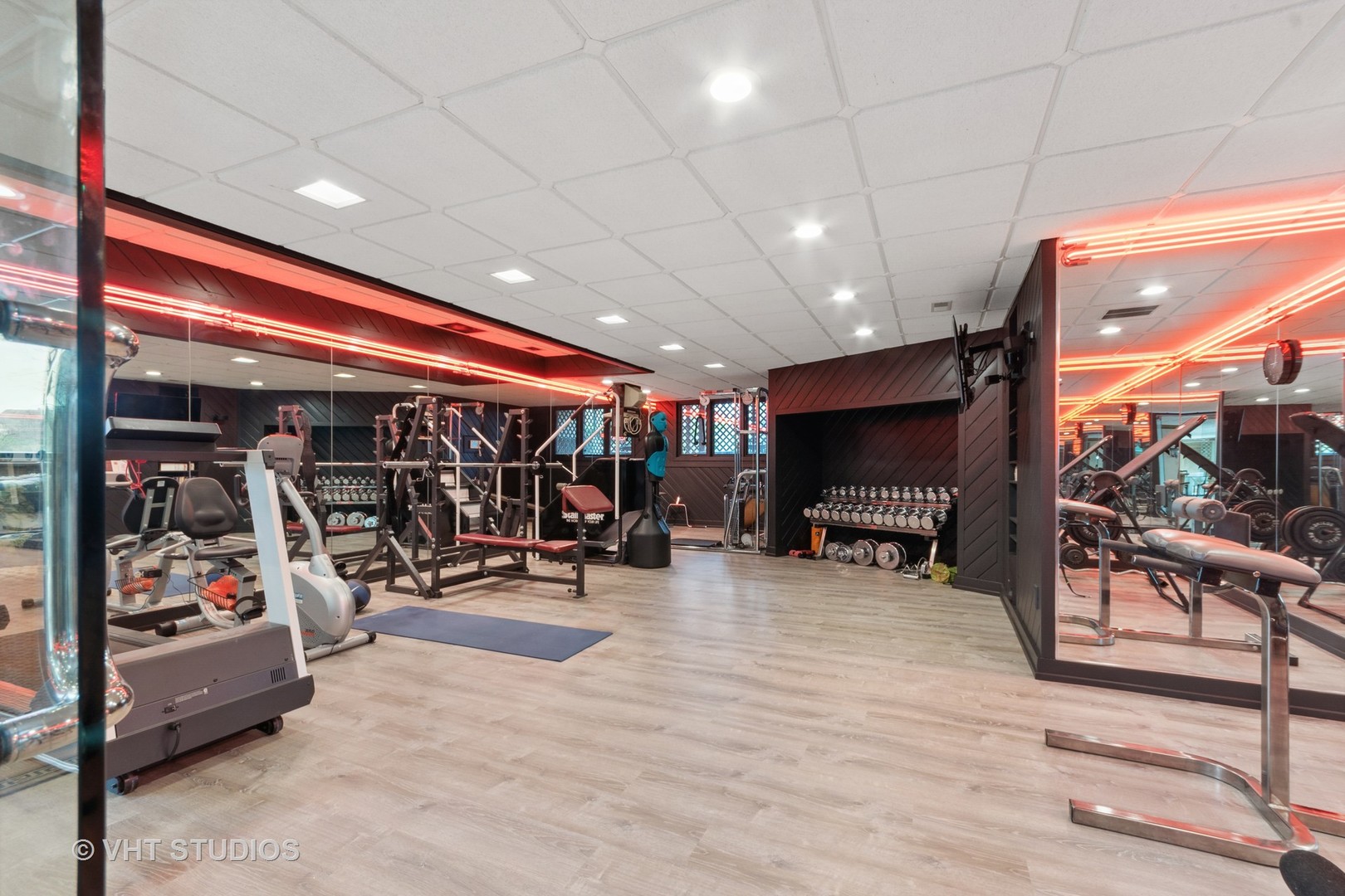 211 Otis Road Barrington Hills, IL 60010 - Photo 44 of 68 a view of a room with gym equipment and a large window