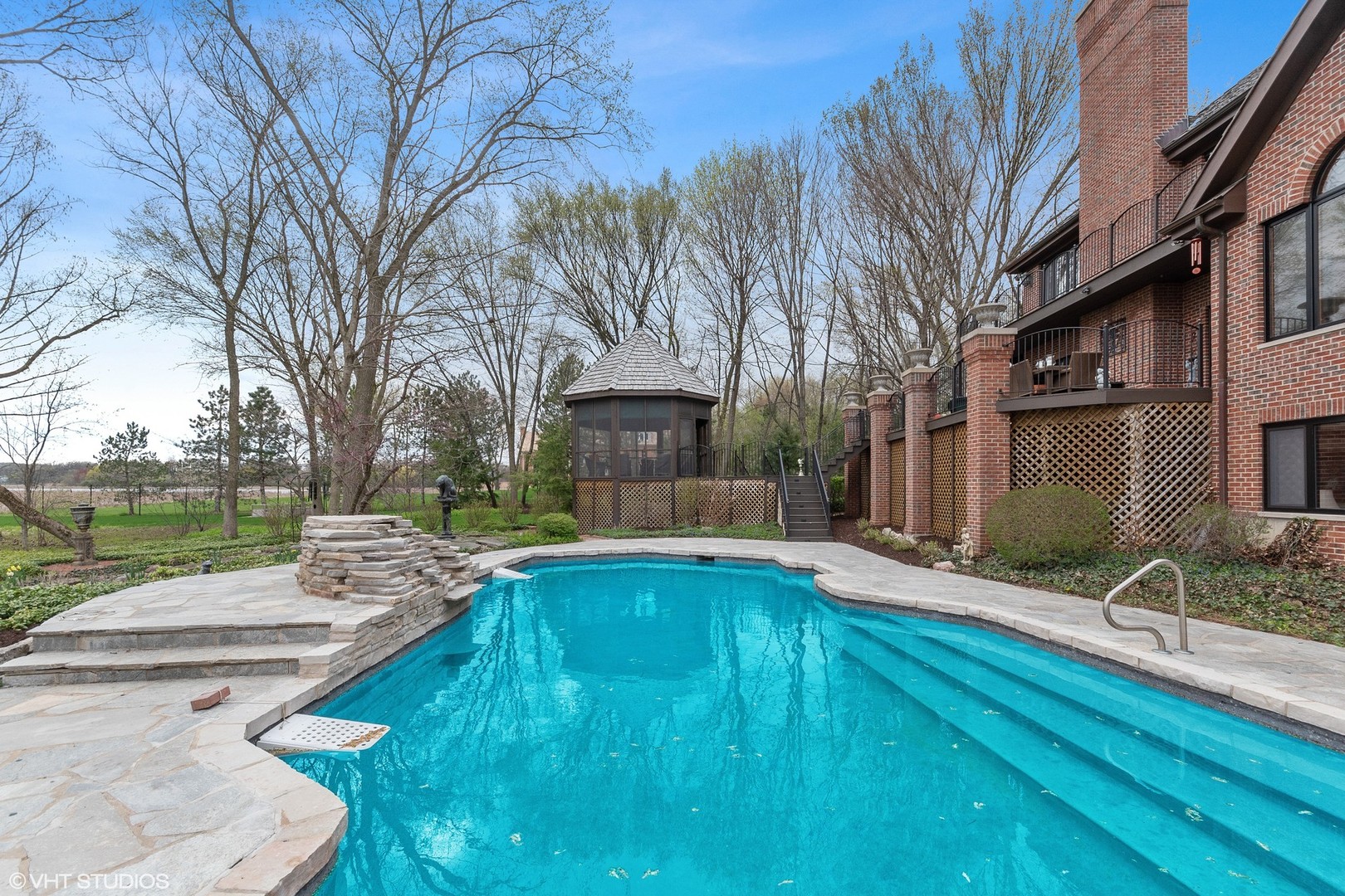 211 Otis Road Barrington Hills, IL 60010 - Photo 48 of 68 a view of a house with backyard and sitting area