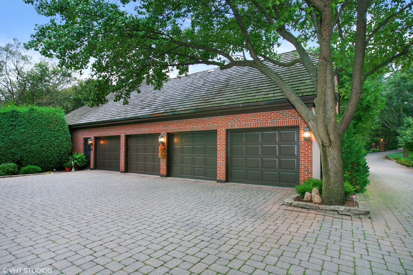 211 Otis Road Barrington Hills, IL 60010 - Photo 59 of 68 a front view of a house with a yard and garage