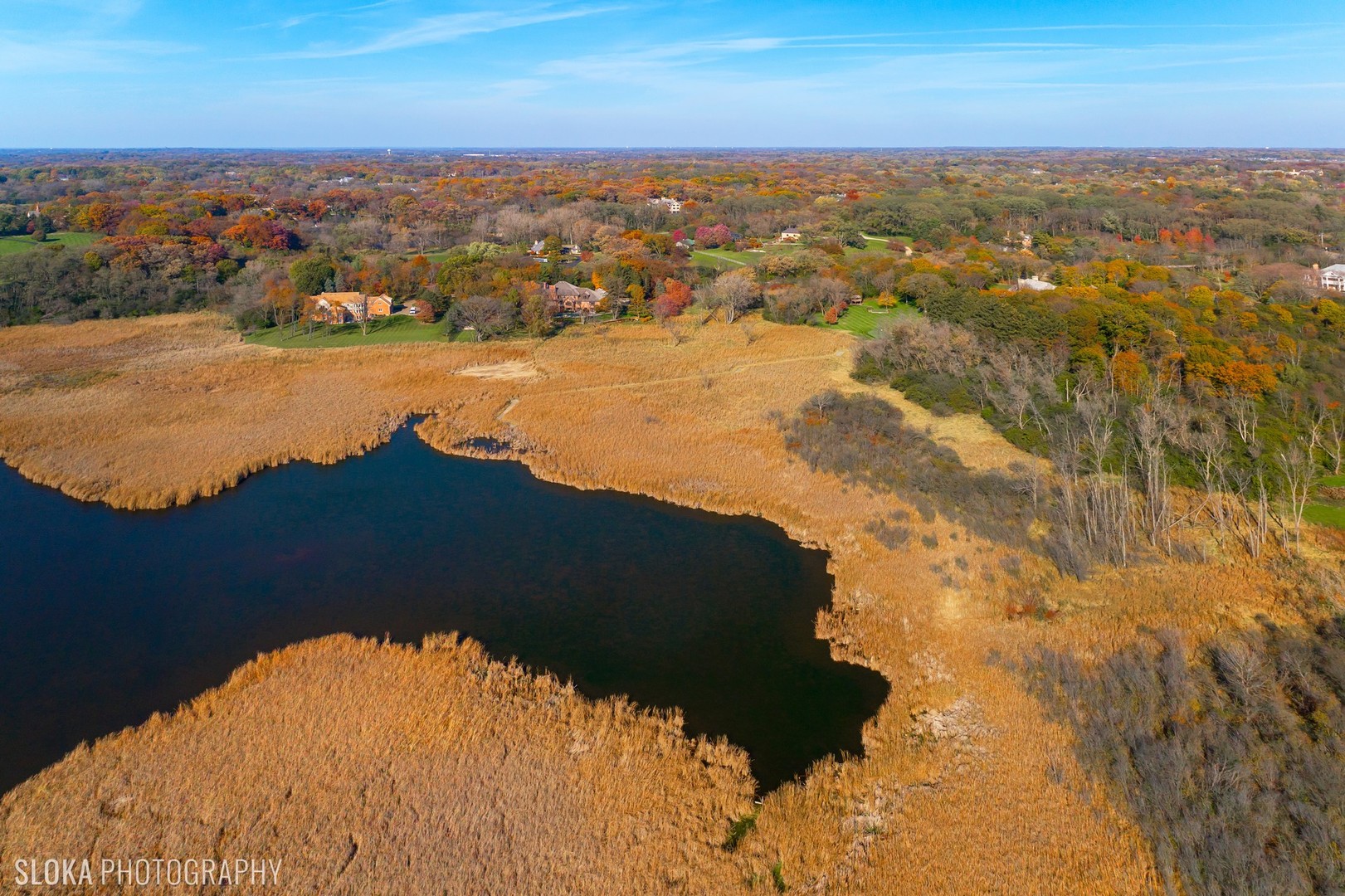 211 Otis Road Barrington Hills, IL 60010 - Photo 63 of 68 an aerial view of ocean and residential houses with outdoor space