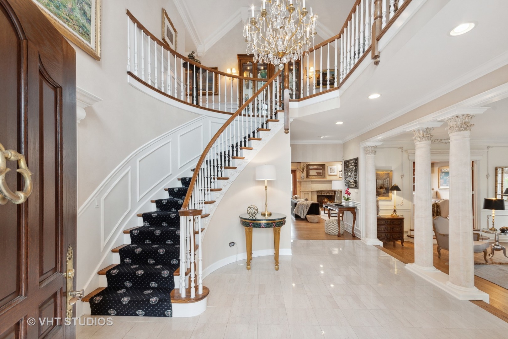 211 Otis Road Barrington Hills, IL 60010 - Photo 8 of 68 a view of entryway and hall with dining room