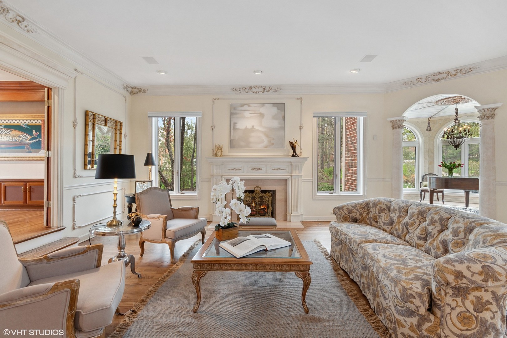 211 Otis Road Barrington Hills, IL 60010 - Photo 9 of 68 a living room with furniture fireplace and flat screen tv