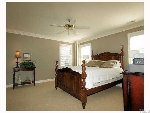 604 Leonidas Court Raleigh, NC 27604 - Photo 6 of 12 The master bedroom presents itself beautifully with detailed trim, crown molding & fresh paint. Plus, there's a huge walk in closet - a wonderful treat in an area known for miniscule closets! Master Bedroom
