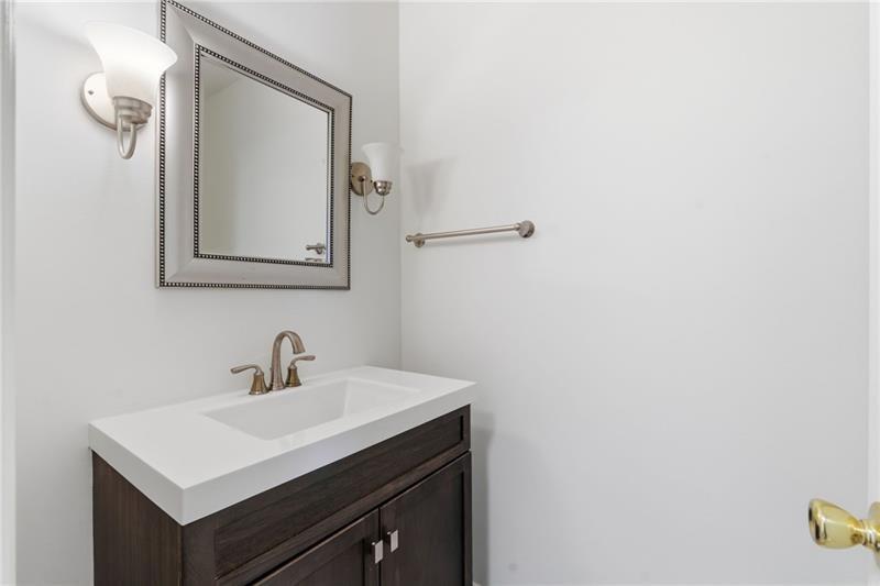6520 Roswell Road, Unit 79 Atlanta, GA 30328 - Photo 14 of 23 a bathroom with a sink and a mirror
