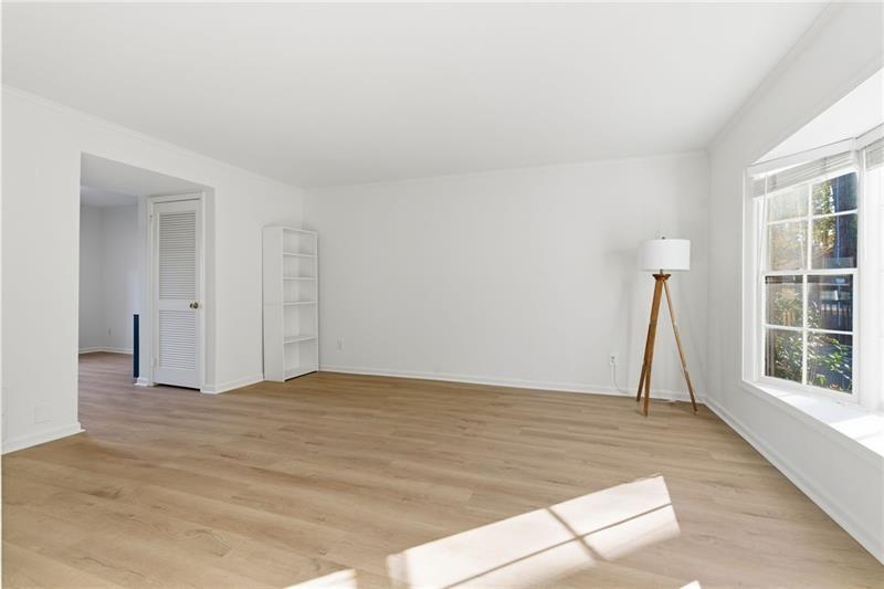 6520 Roswell Road, Unit 79 Atlanta, GA 30328 - Photo 5 of 23 a view of empty room with windows
