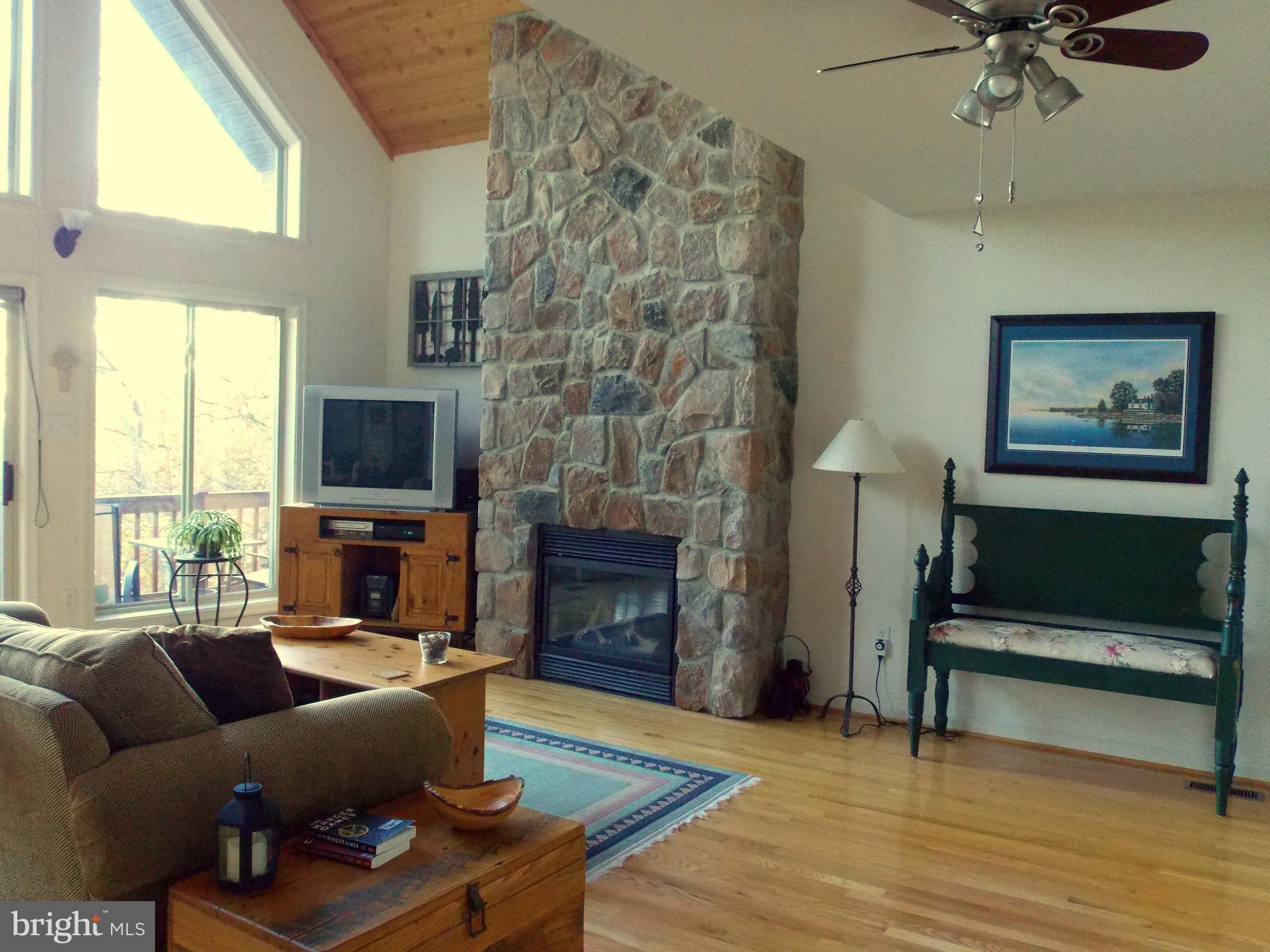 169 Boulder Road Front Royal, VA 22630 - Photo 12 of 30 Living Room w/floor-to-ceiling stone gas fireplace