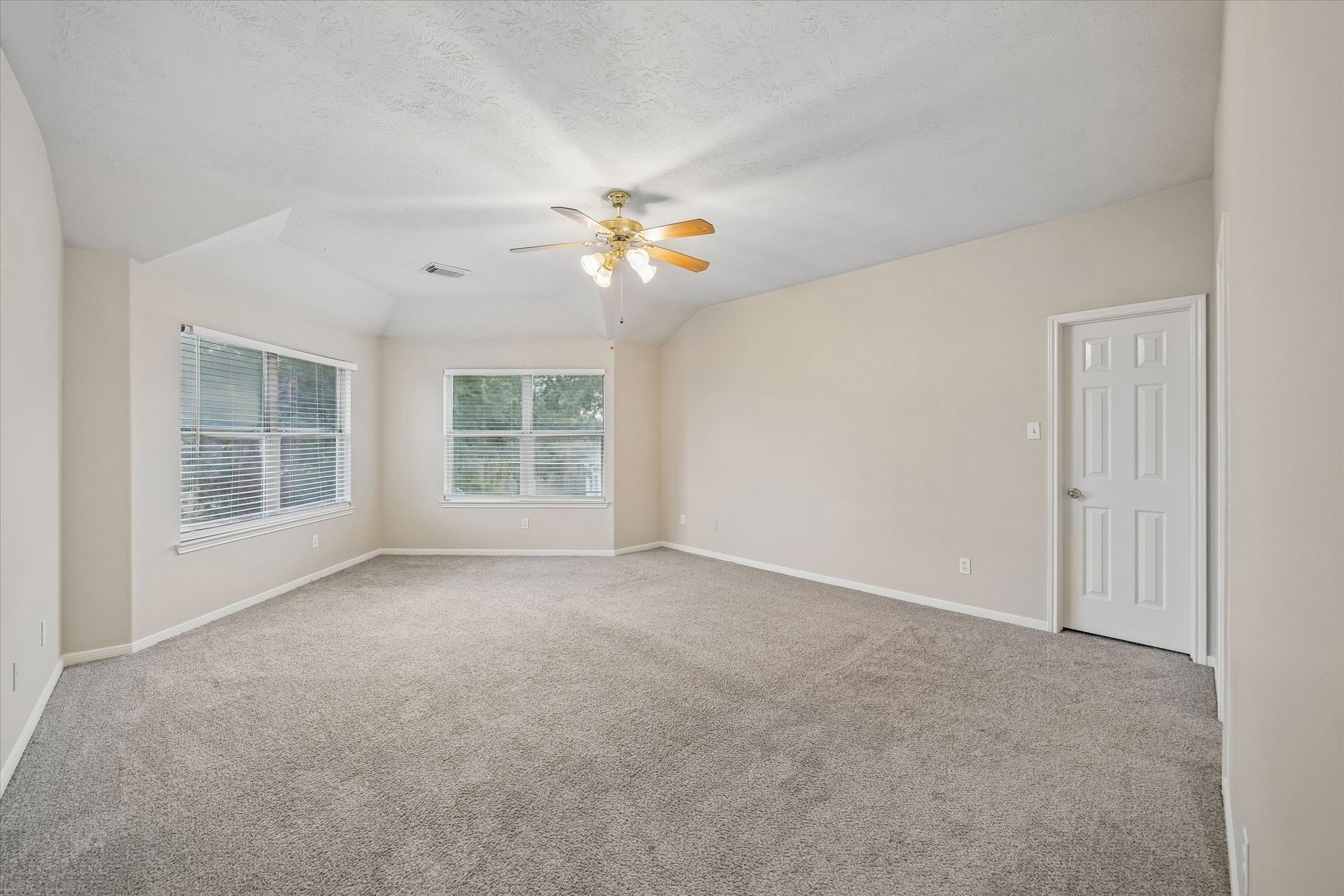 10307 Turrett Point Lane Houston, TX 77064 - Photo 6 of 12 a view of an empty room with a window