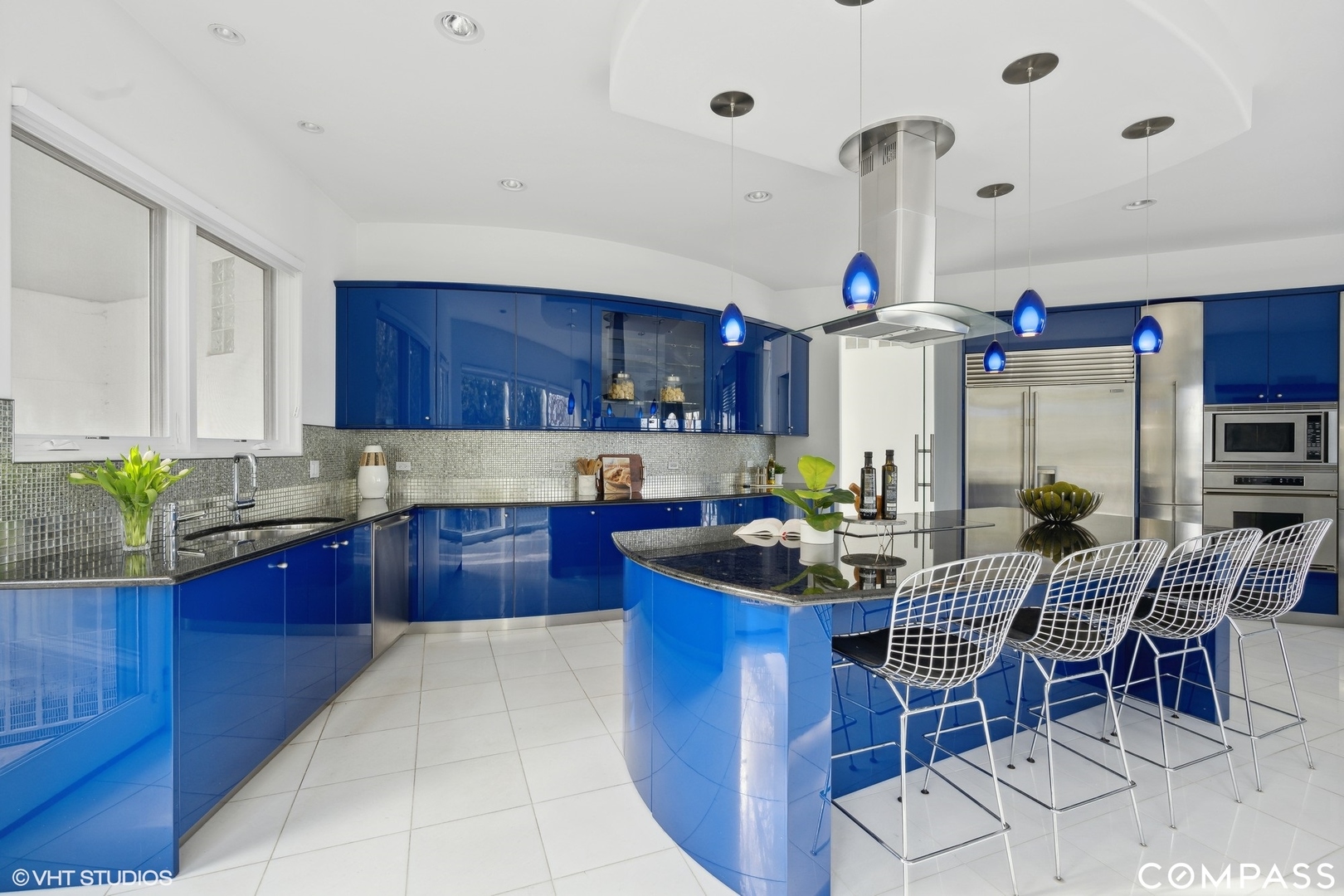 25 Aspen Lane Glencoe, IL 60022 - Photo 18 of 47 a kitchen with granite countertop a sink stove and cabinets