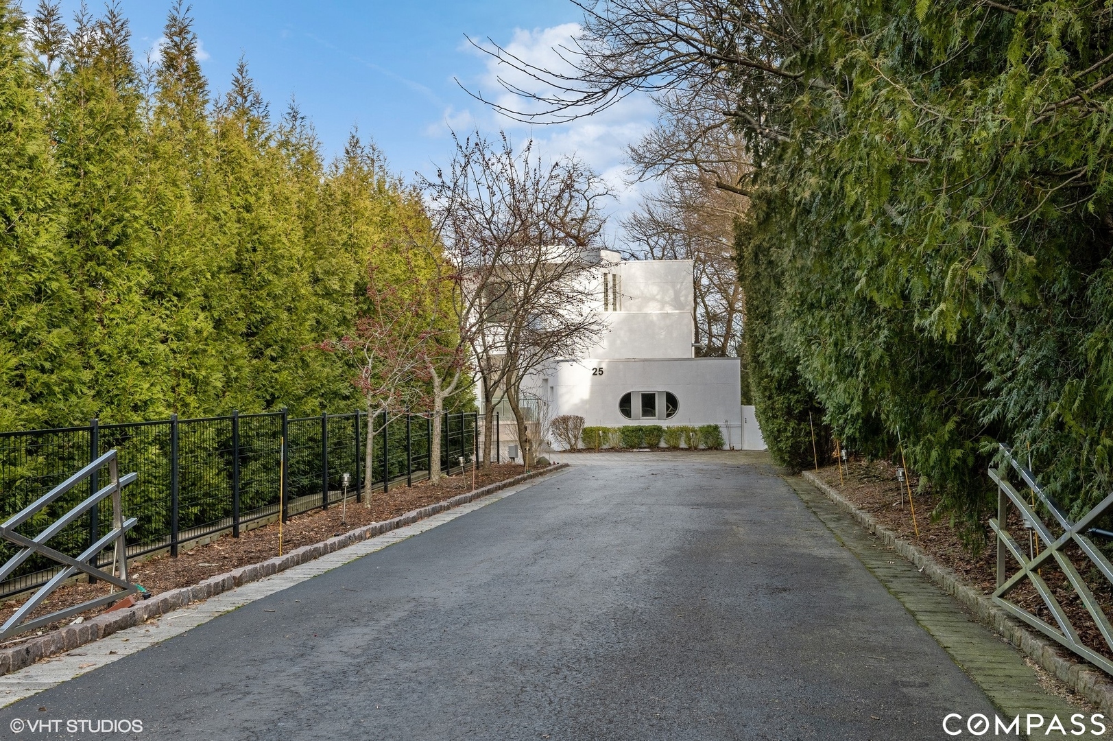 25 Aspen Lane Glencoe, IL 60022 - Photo 2 of 47 a view of a house with a street