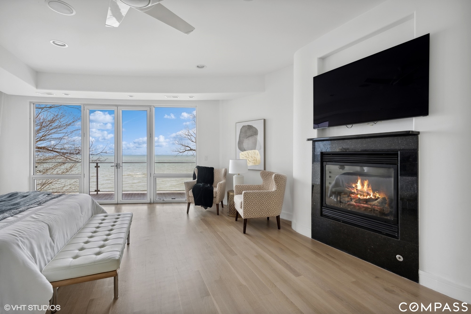 25 Aspen Lane Glencoe, IL 60022 - Photo 24 of 47 a living room with furniture a flat screen tv and a fireplace