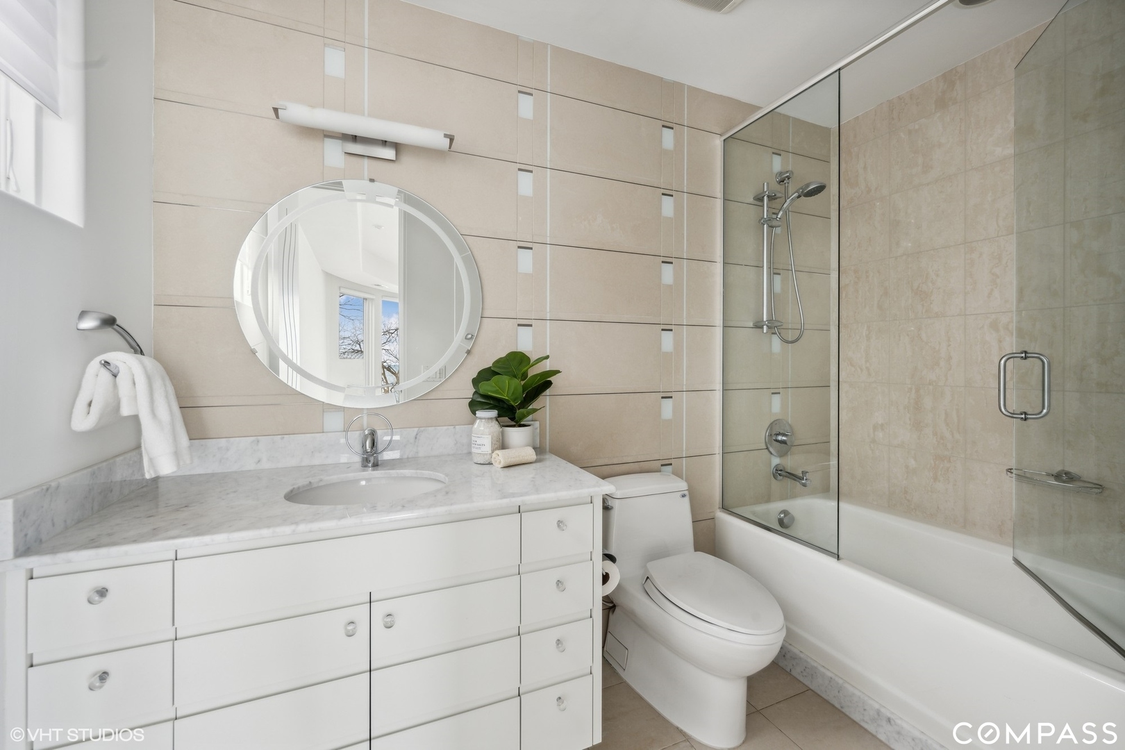 25 Aspen Lane Glencoe, IL 60022 - Photo 37 of 47 a bathroom with a sink toilet and shower