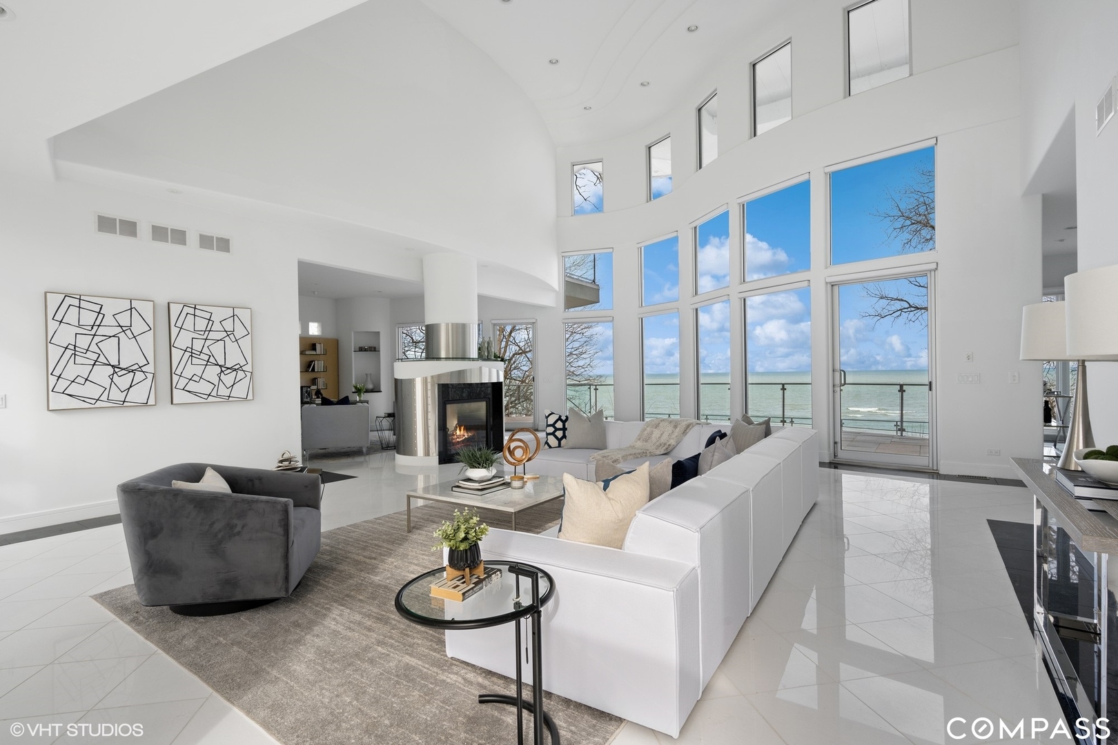 25 Aspen Lane Glencoe, IL 60022 - Photo 7 of 47 a living room with furniture fireplace and a large window