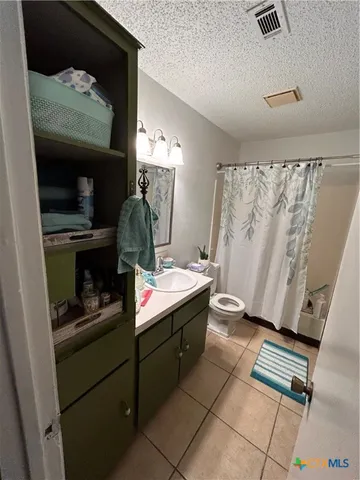 a room with storage and utility