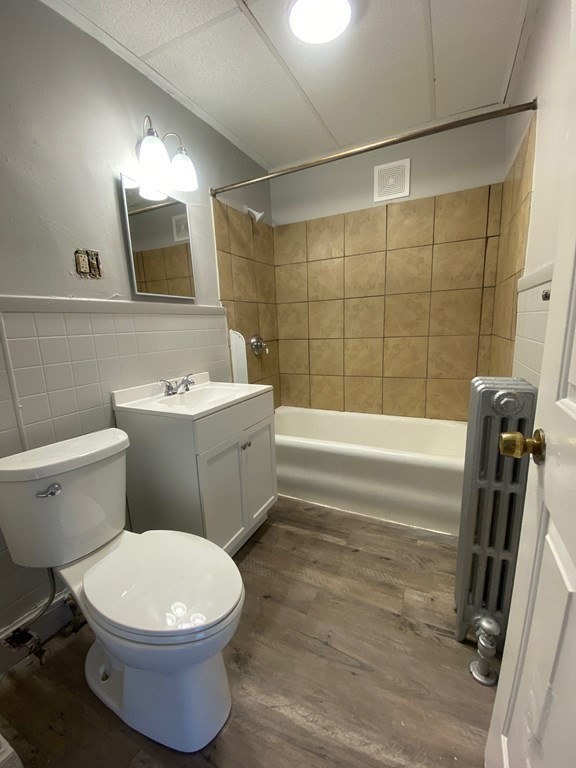 331-335 Allen Street Springfield, MA 01108 - Photo 3 of 8 a bathroom with a sink toilet and shower