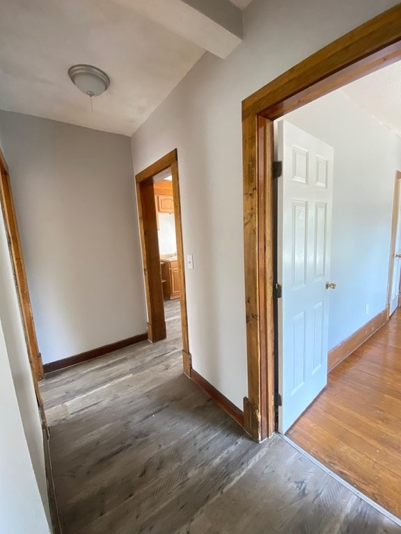 331-335 Allen Street Springfield, MA 01108 - Photo 8 of 8 a view of a hallway with wooden floor and closet