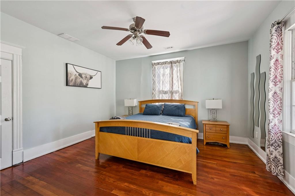 528 Holderness Street Southwest Atlanta, GA 30310 - Photo 22 of 42 a bed room with a bed and a window