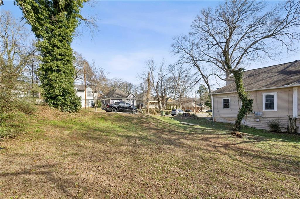 528 Holderness Street Southwest Atlanta, GA 30310 - Photo 42 of 42 a view of a yard with a large tree