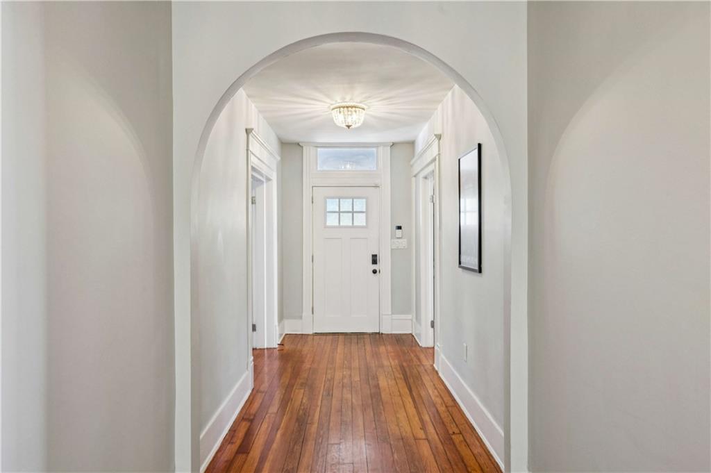 528 Holderness Street Southwest Atlanta, GA 30310 - Photo 5 of 42 a view of a hallway with wooden floor