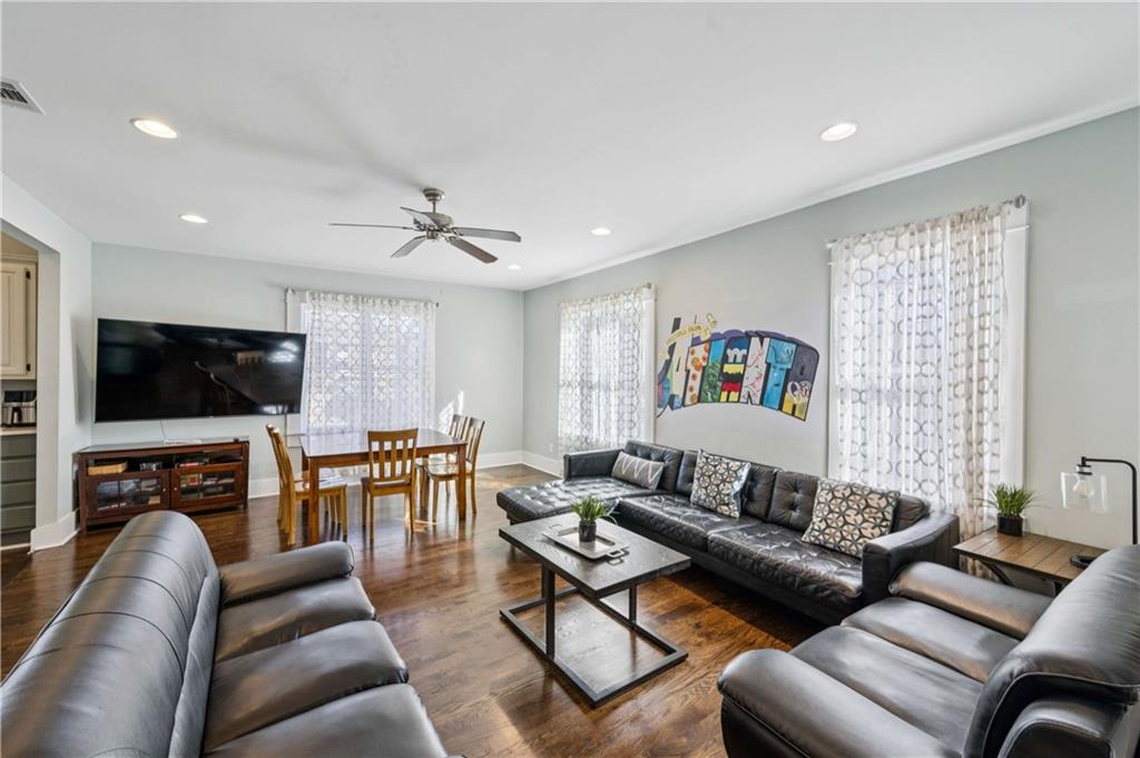 528 Holderness Street Southwest Atlanta, GA 30310 - Photo 7 of 42 a living room with furniture and a flat screen tv