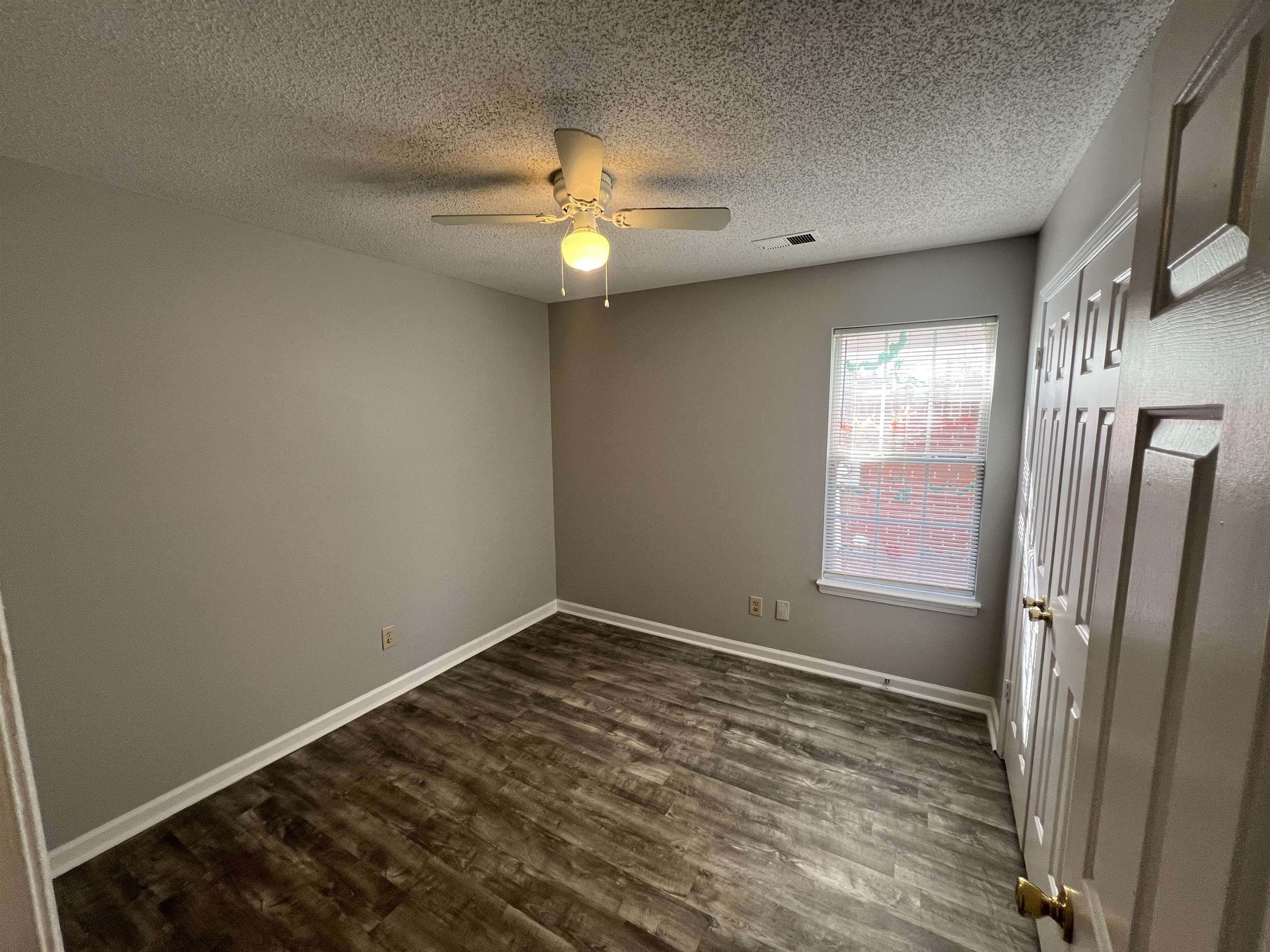 3315 Tulane Road West Horn Lake, MS 38637 - Photo 8 of 13 an empty room with windows and closet