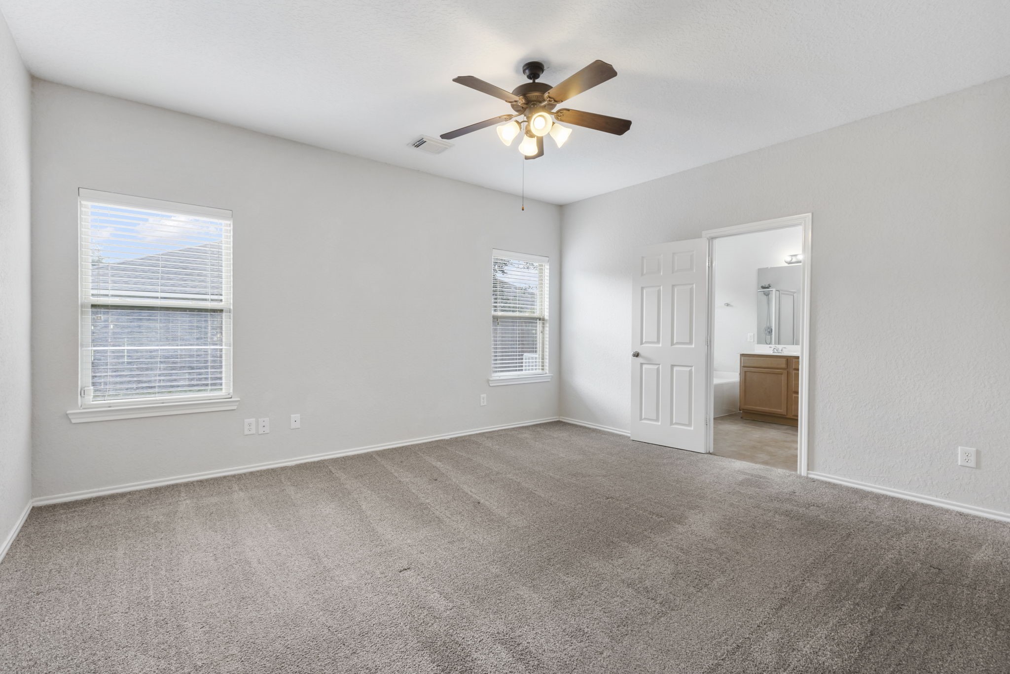 21810 Colter Stone Drive Spring, TX 77388 - Photo 16 of 33 a view of an empty room with a window