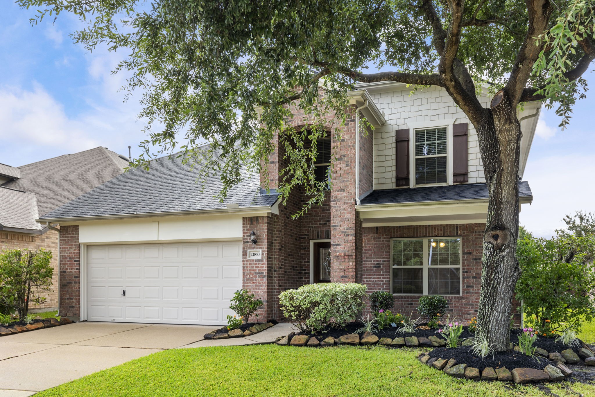 21810 Colter Stone Drive Spring, TX 77388 - Photo 2 of 33 a front view of house with yard
