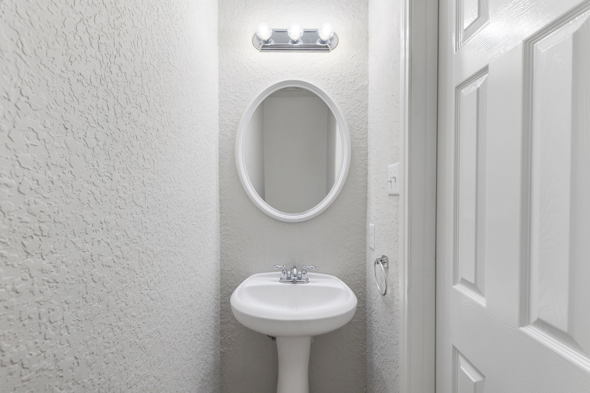 21810 Colter Stone Drive Spring, TX 77388 - Photo 20 of 33 a bathroom with a sink and a mirror