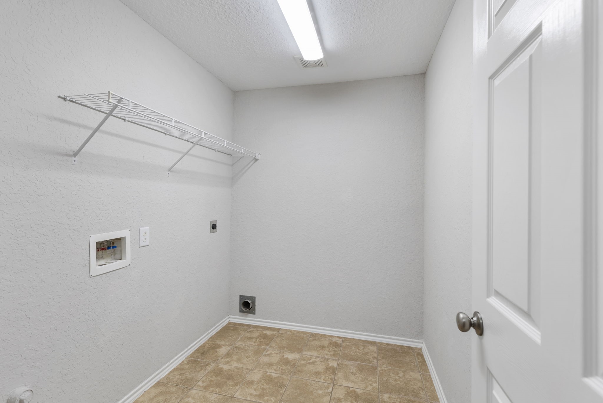21810 Colter Stone Drive Spring, TX 77388 - Photo 21 of 33 a view of a room with rack on the wall