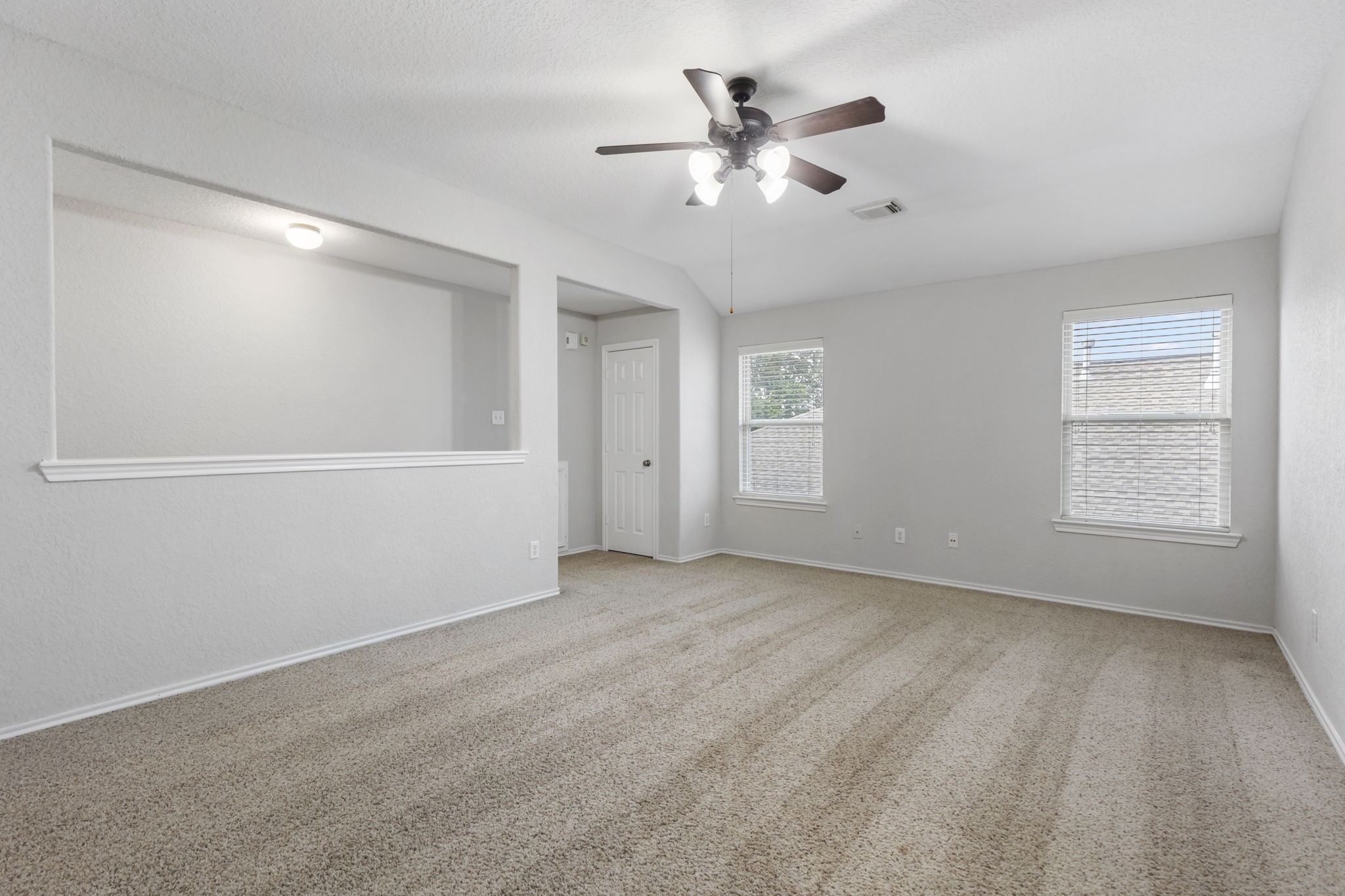 21810 Colter Stone Drive Spring, TX 77388 - Photo 23 of 33 wooden floor in an empty room with a window