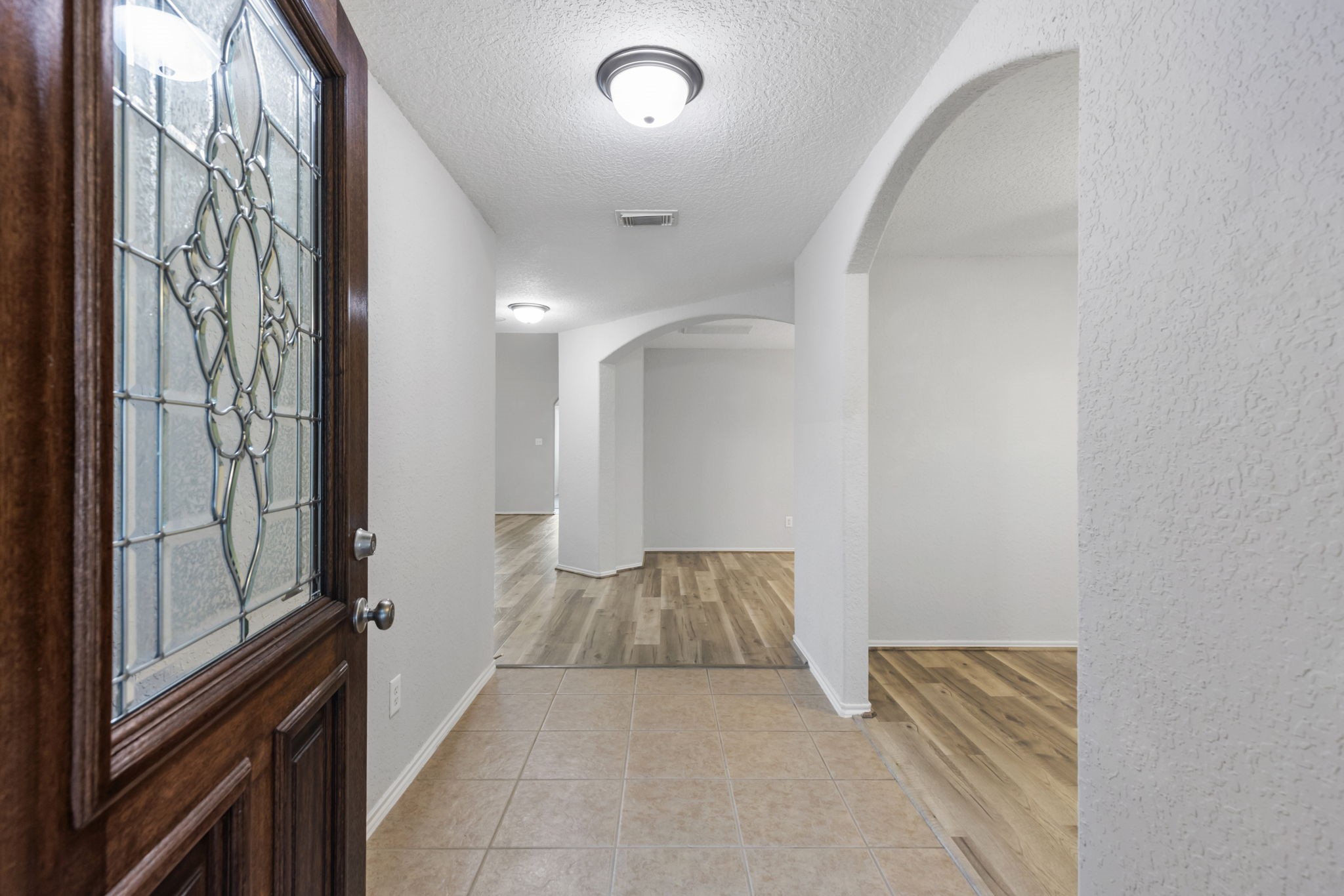 21810 Colter Stone Drive Spring, TX 77388 - Photo 4 of 33 a view of entryway with a bathtub and shower