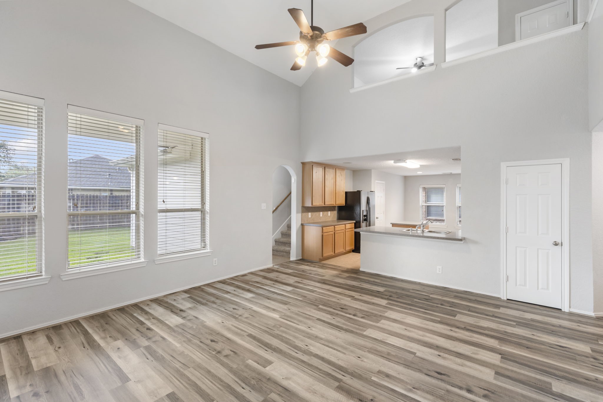 21810 Colter Stone Drive Spring, TX 77388 - Photo 5 of 33 a view of empty room with wooden floor and fan