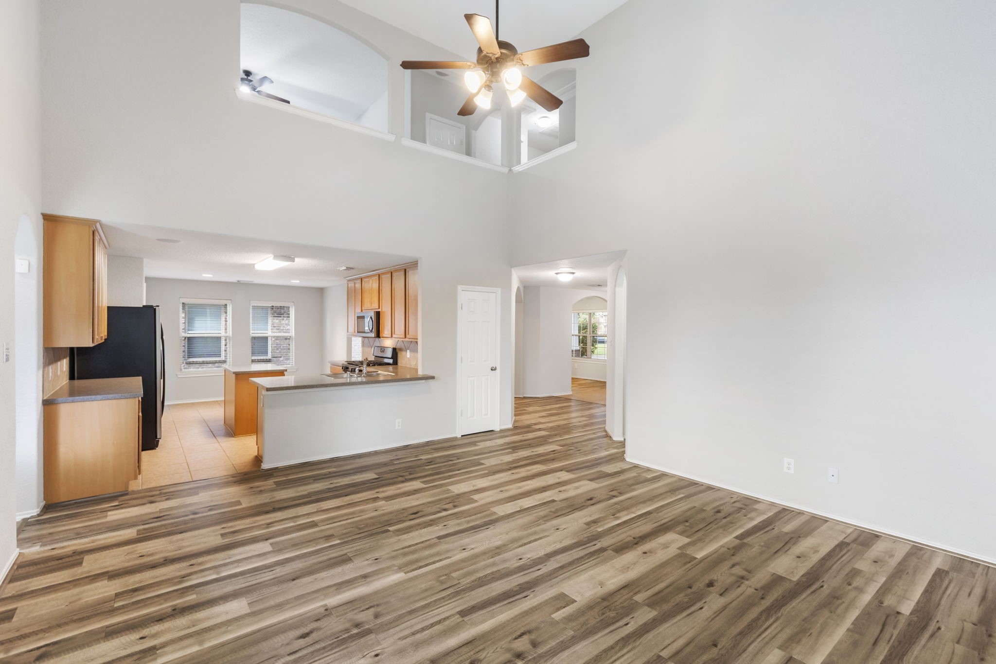21810 Colter Stone Drive Spring, TX 77388 - Photo 6 of 33 a view of an empty room and kitchen view