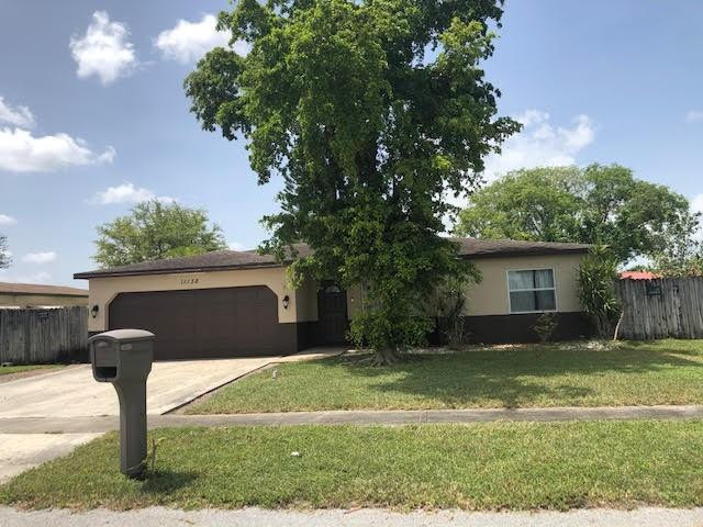 11138 Ladino Street Boca Raton, FL 33428 - Photo 2 of 17 front exposure facing North.
