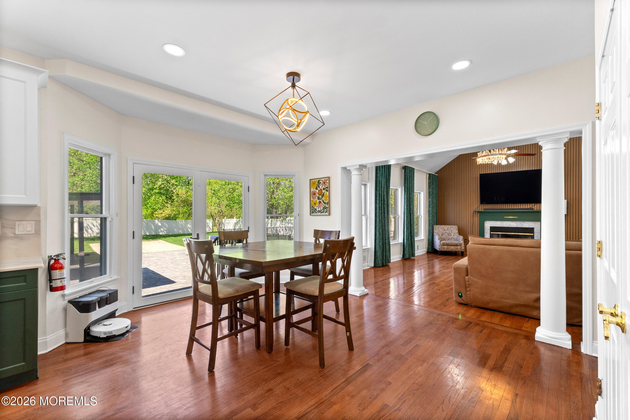 104 Autumn Road Matawan, NJ 07747 - Photo 19 of 64 a view of a dining room with furniture window and wooden floor