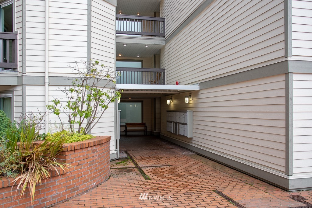 2152 North 112th Street, Unit 303 Seattle, WA 98133 - Photo 14 of 19 a view of an outdoor space with a window