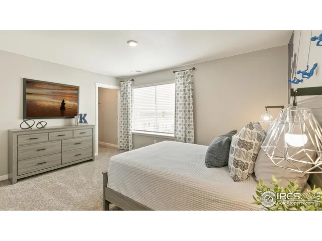 a bathroom with a sink double vanity granite tub shower and a mirror