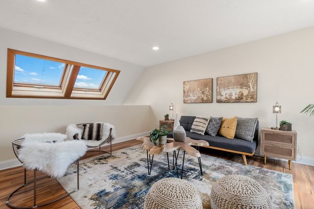 a living room with furniture and rug