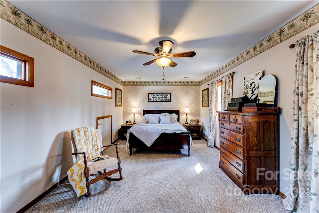 25030 Riley Lane Tega Cay, SC 29708 - Photo 14 of 48 a living room with furniture and a chandelier