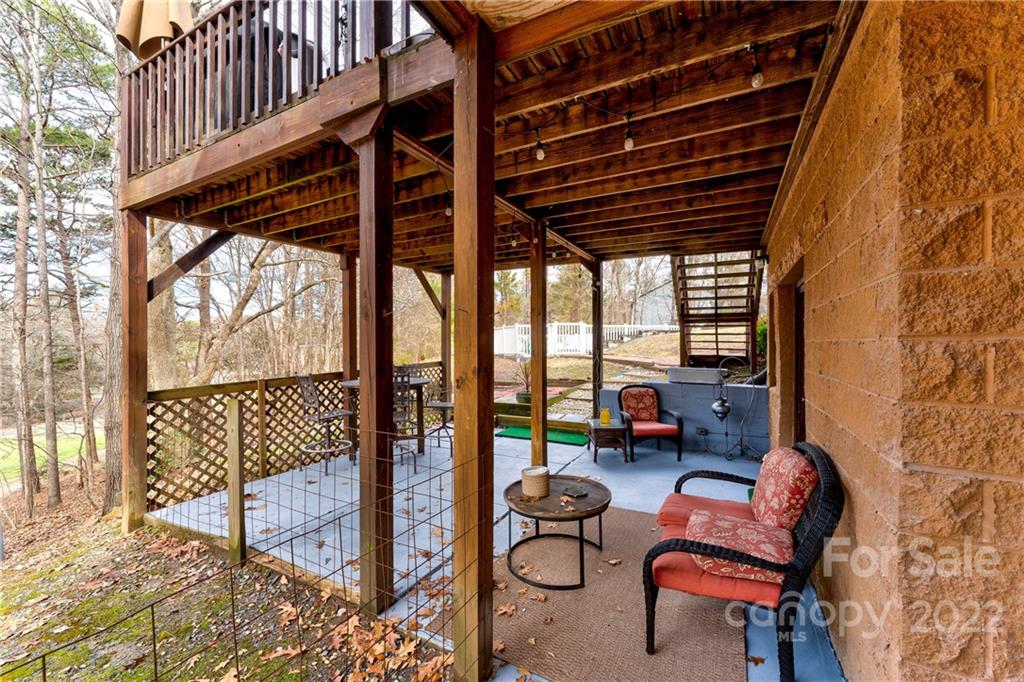 25030 Riley Lane Tega Cay, SC 29708 - Photo 24 of 48 a outdoor space with patio the couches and a potted plant on a table and chairs