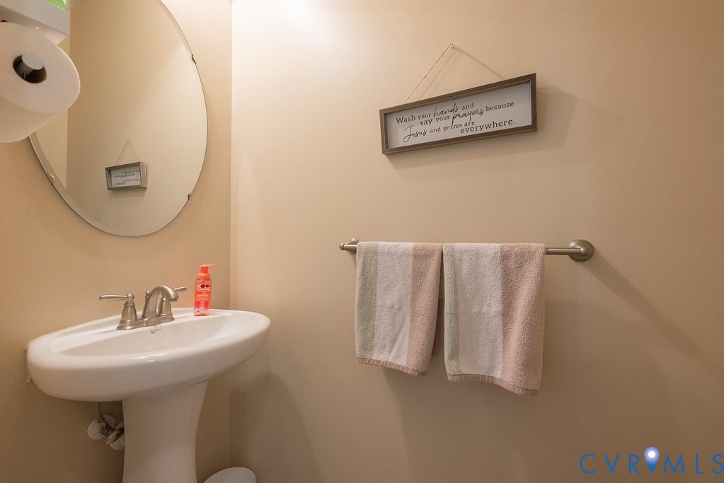 10523 Tea Olive Circle Providence Forge, VA 23140 - Photo 11 of 46 a bathroom with a sink and a mirror