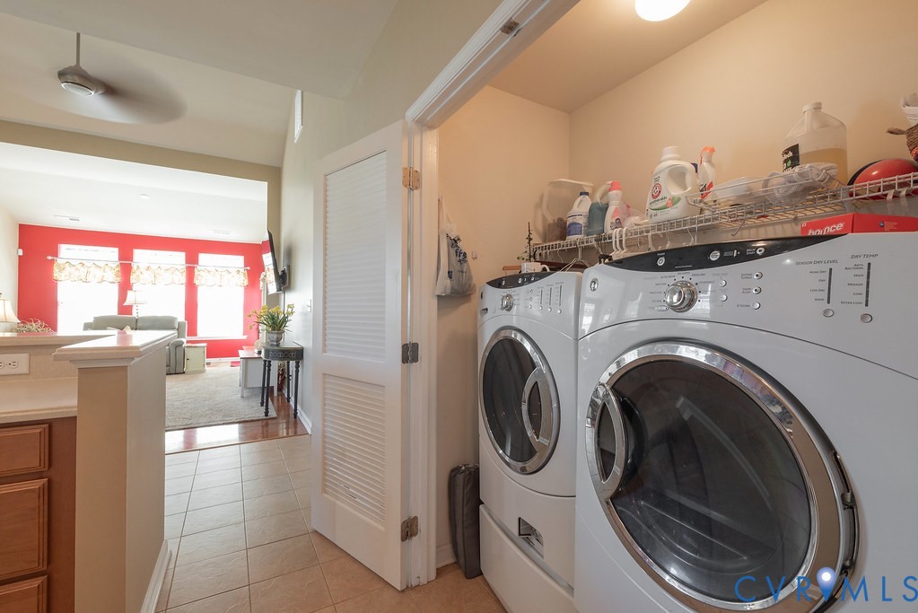 10523 Tea Olive Circle Providence Forge, VA 23140 - Photo 18 of 46 a view of a storage and utility room with washer and dryer