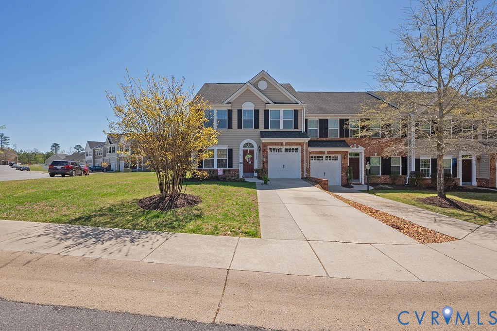 10523 Tea Olive Circle Providence Forge, VA 23140 - Photo 2 of 46 a front view of a house with garden
